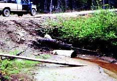 photo: incorrectly installed culvert and resulting sediment